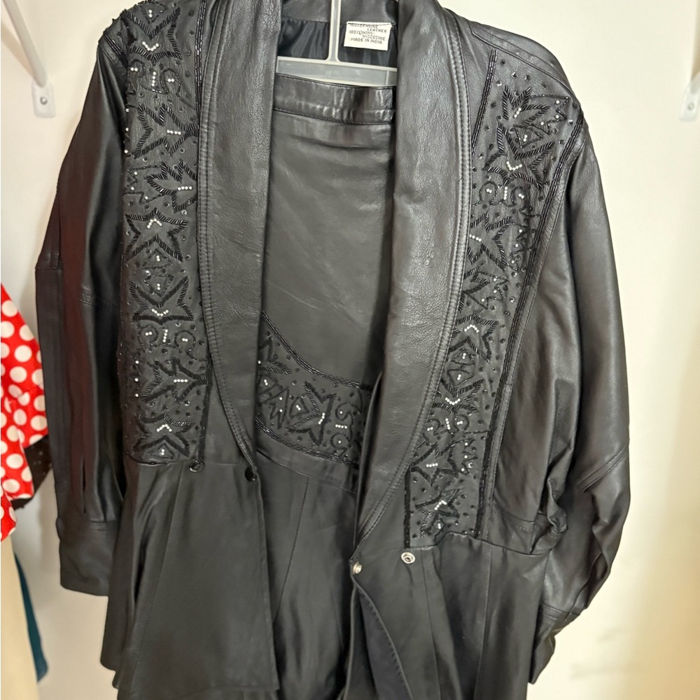 Black Leather Skirt Set with Elegant Design - Picture 2 of 4